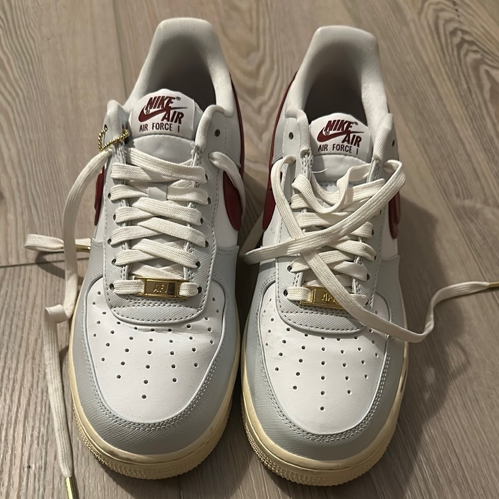 Nike White and Red Leather Sneakers with Low-Top Design